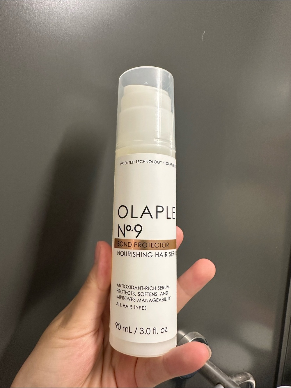 OLAPLEX No.9 Bond Protector Nourishing Hair Serum — White with Black Text